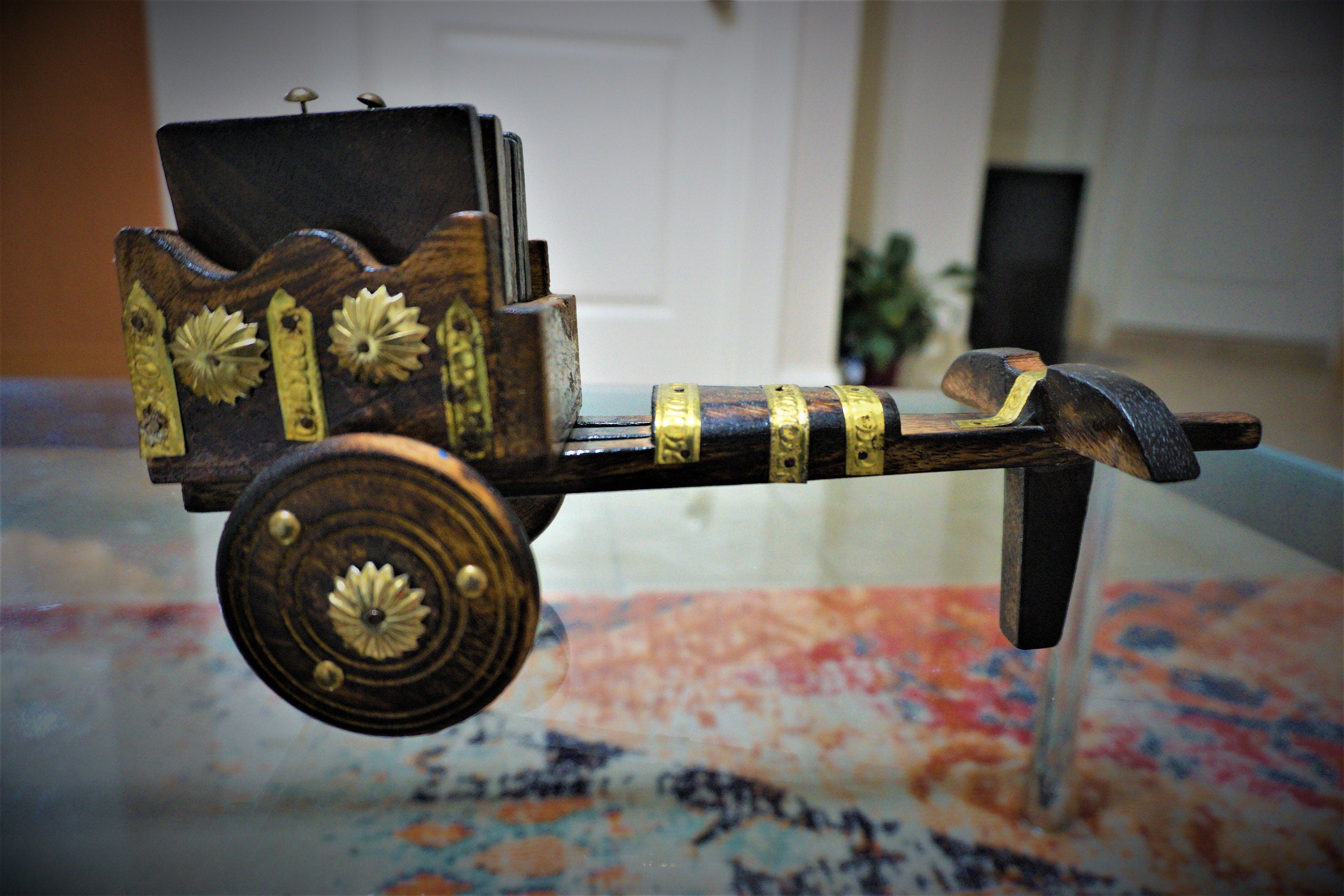 Wooden Handcrafted Mobile Bullok Cart Shaped Coasters (6 Pcs) with Gold color Metal Embedding
