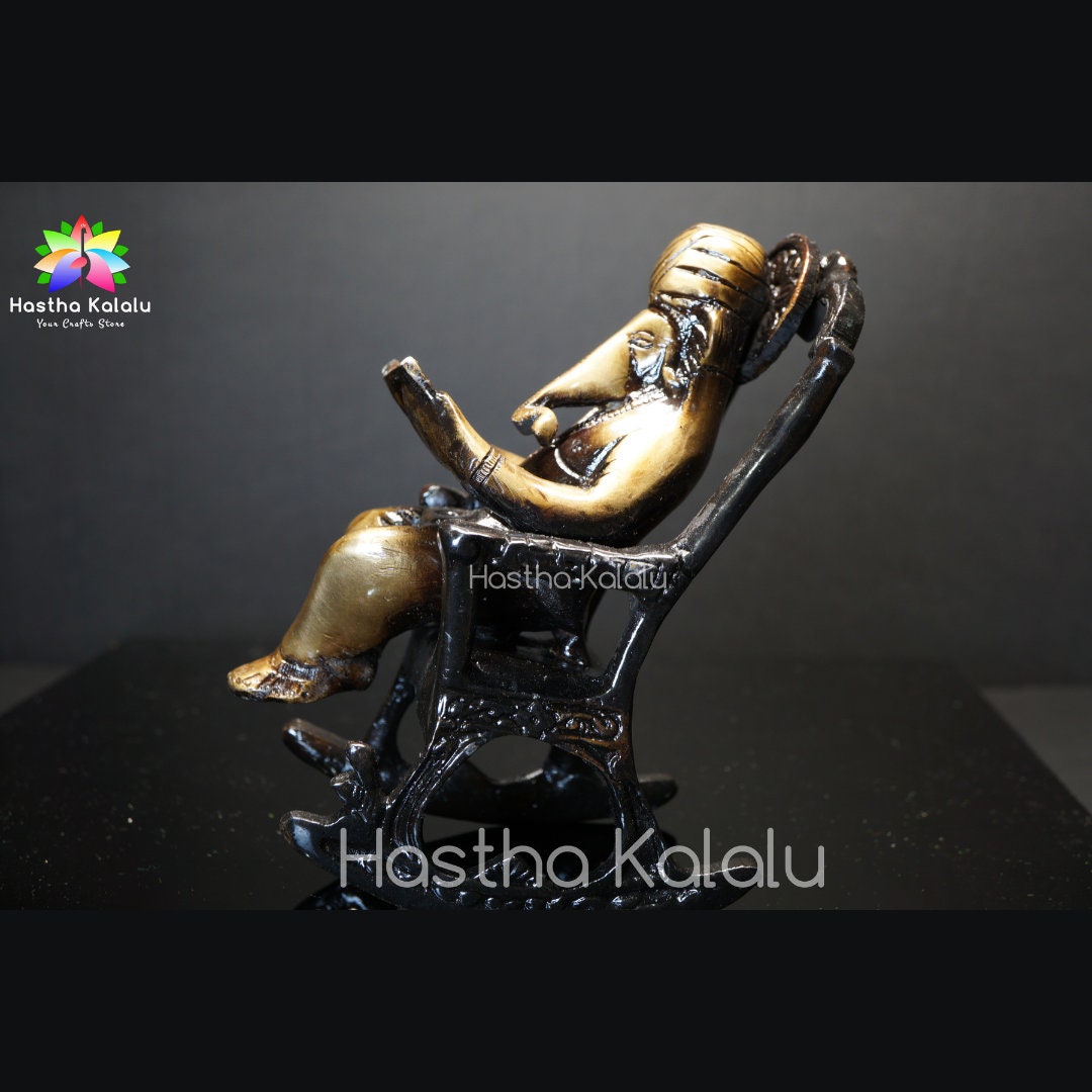 Brass Lord Ganesha on Rocking Chair with Antique Finish