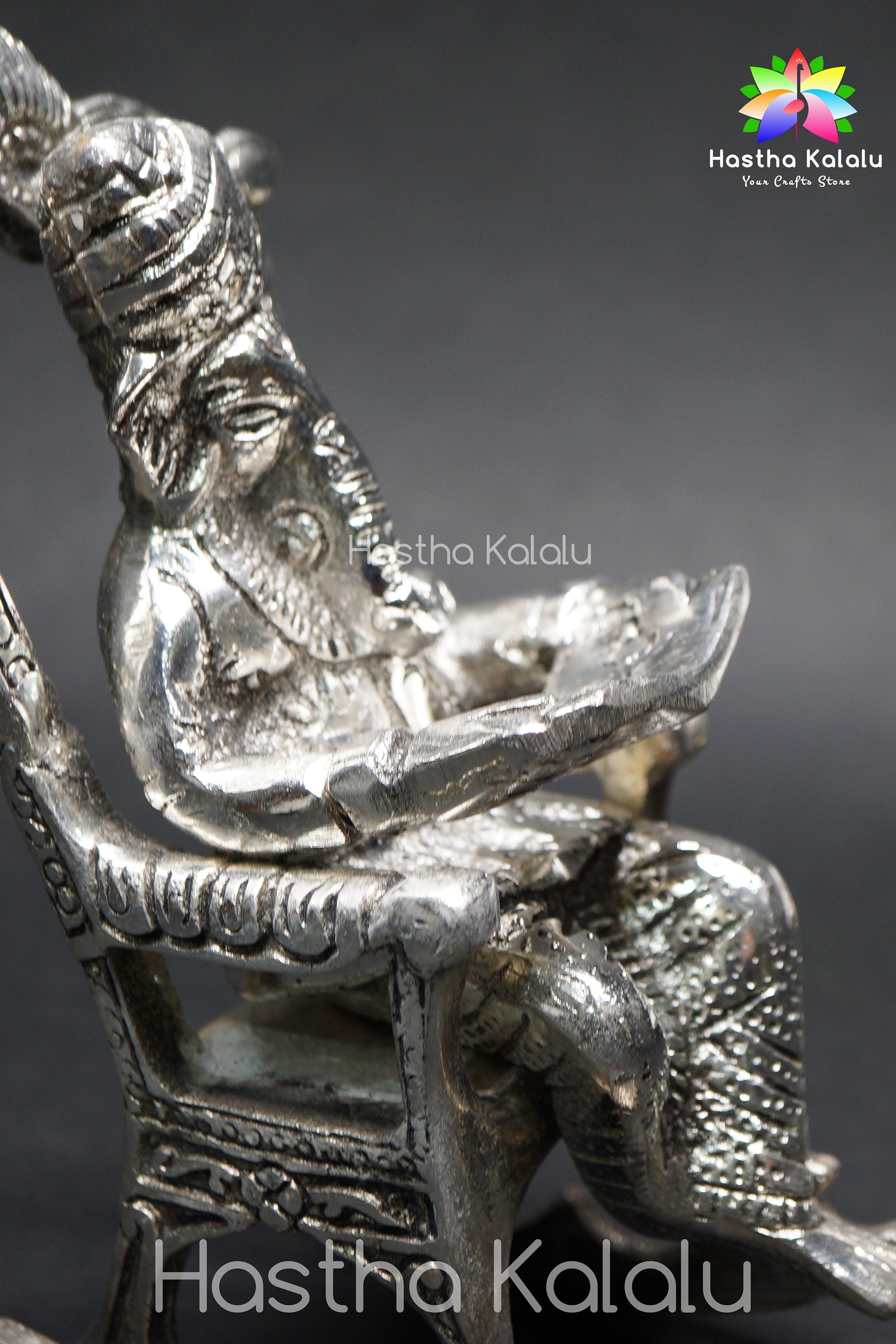 Lord Ganesha on Rocking Chair