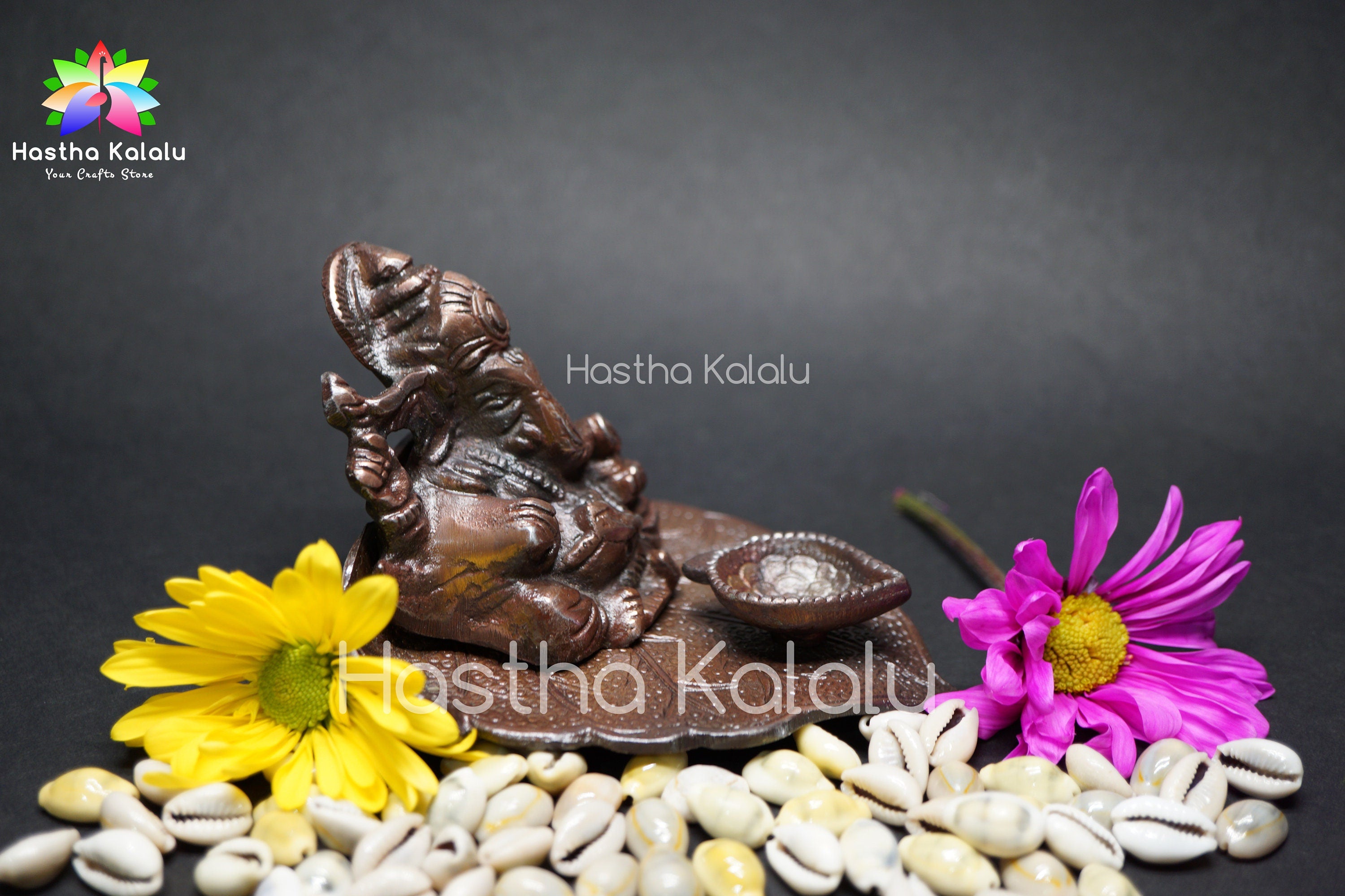 Metal Lord Ganesha with Diya on Leaf