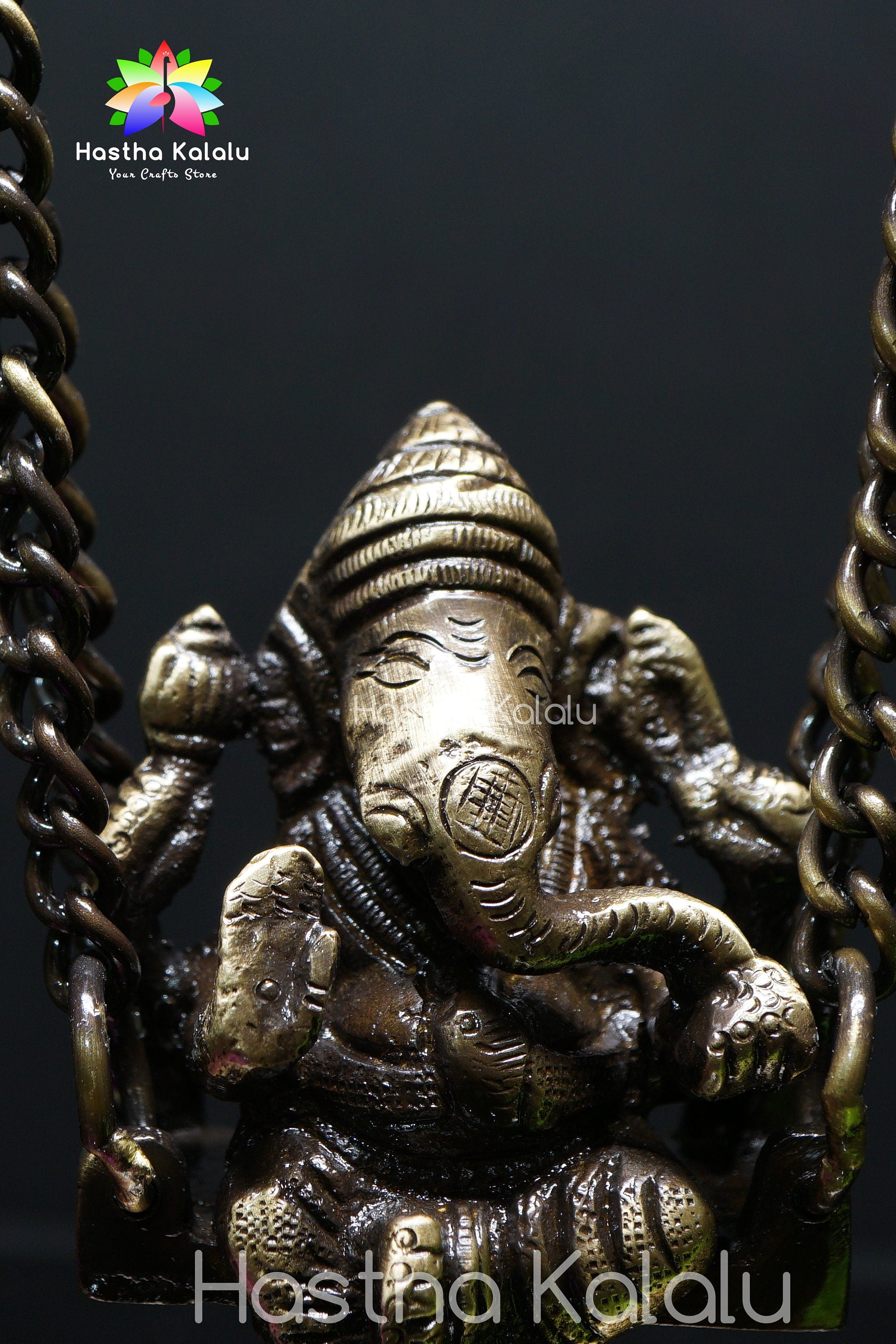 Brass Ganesh Jhula Idol on Parrot Pillar