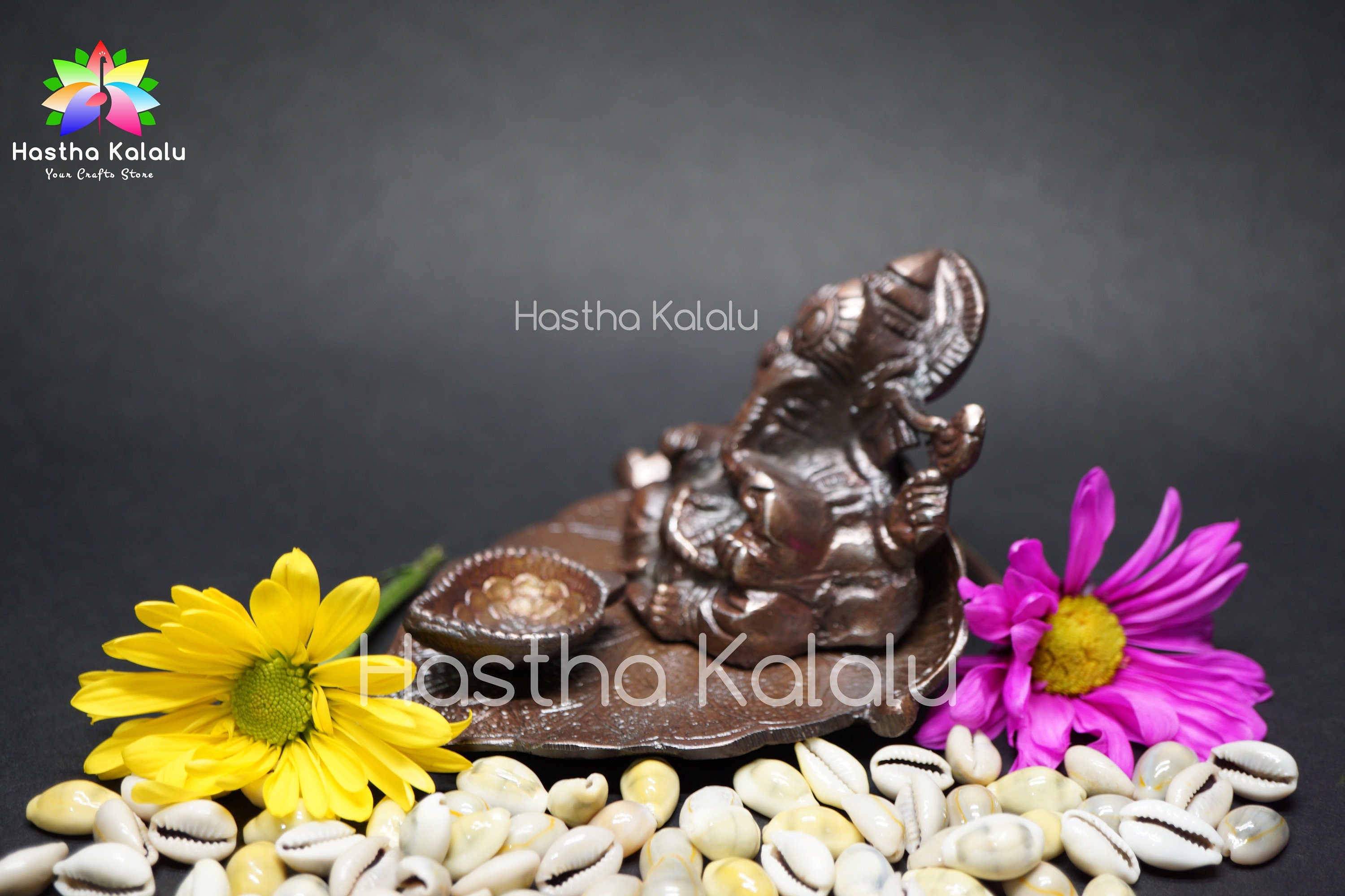 Metal Lord Ganesha with Diya on Leaf