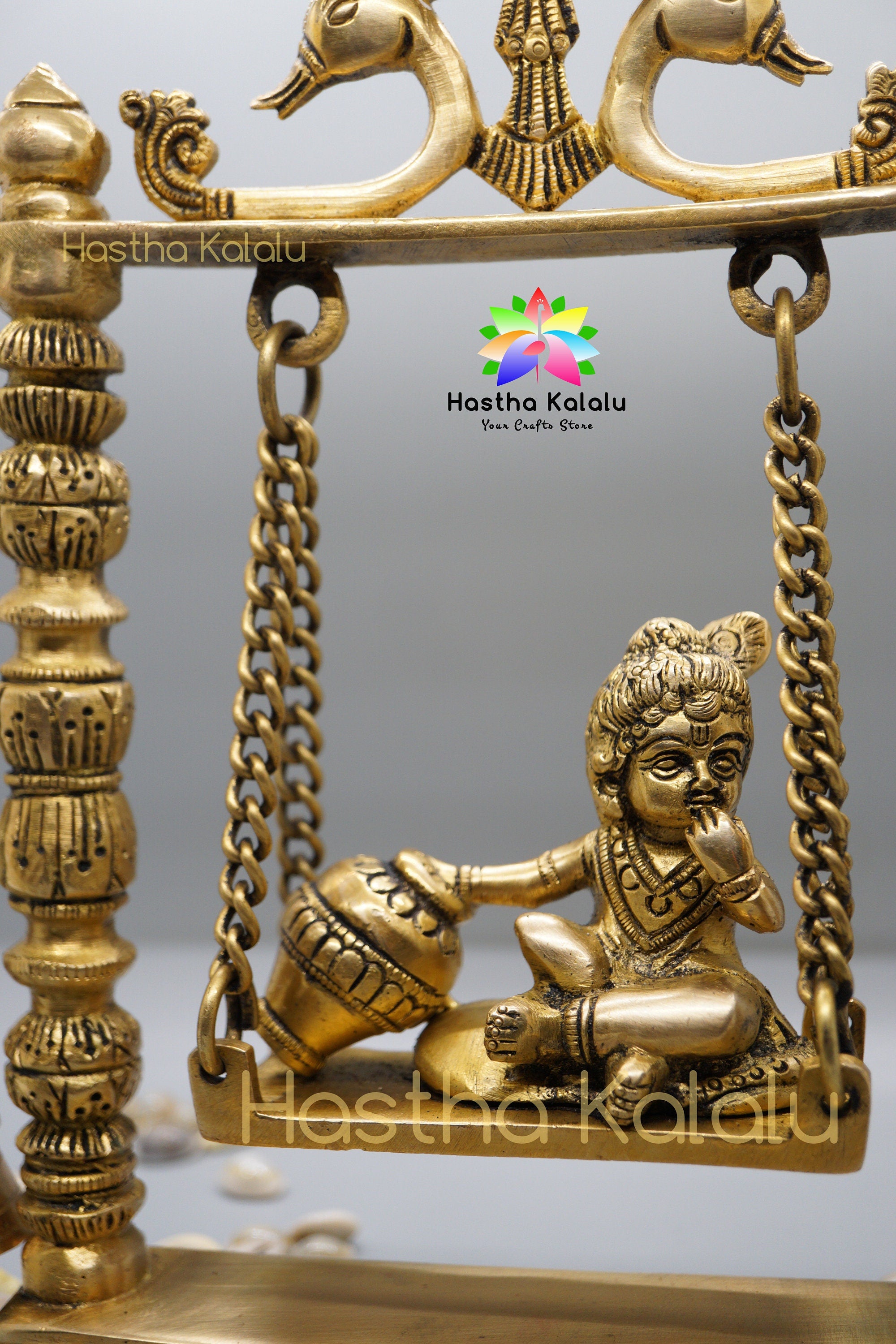 Lord Krishna Sitting Statue with Jhula