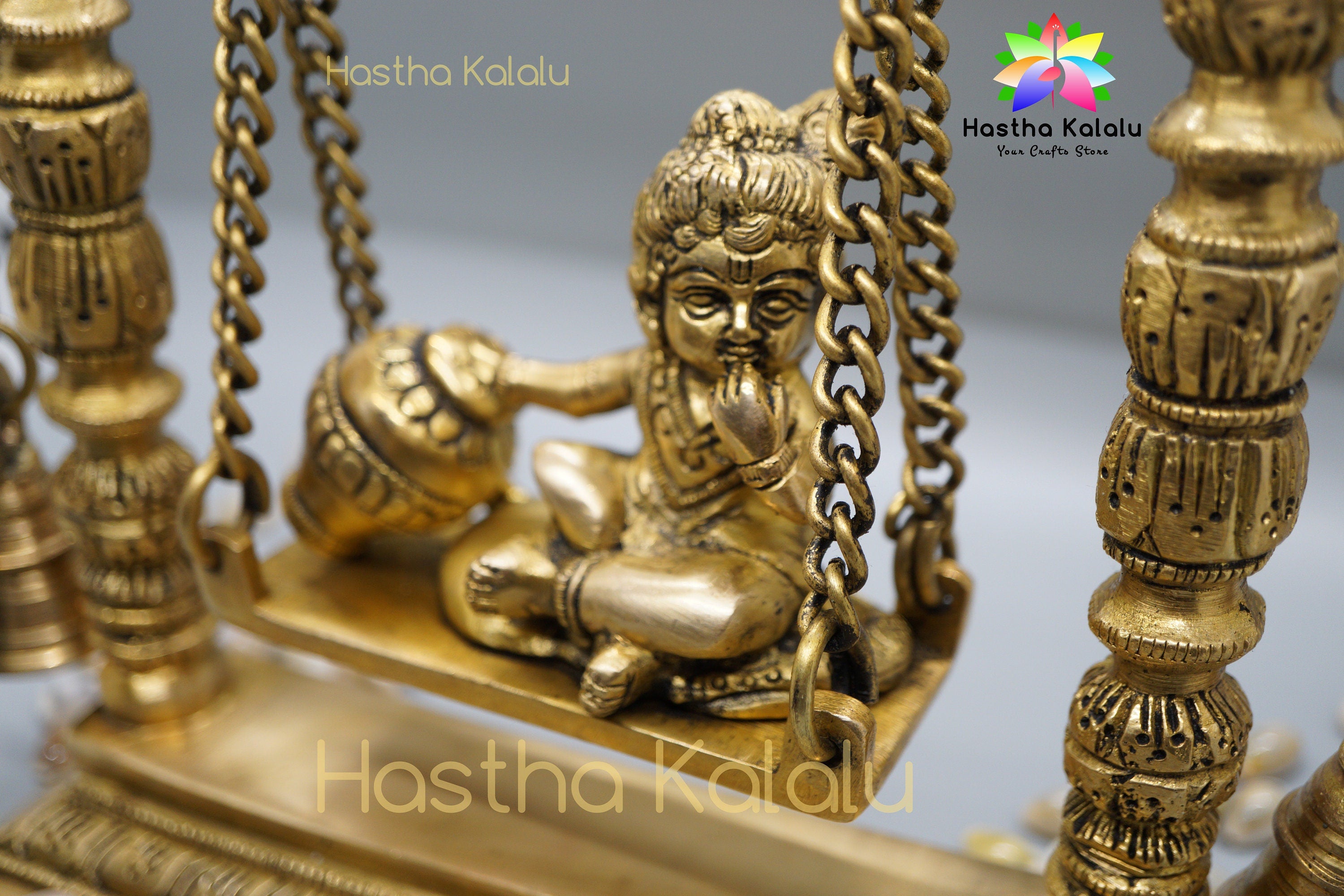 Lord Krishna Sitting Statue with Jhula