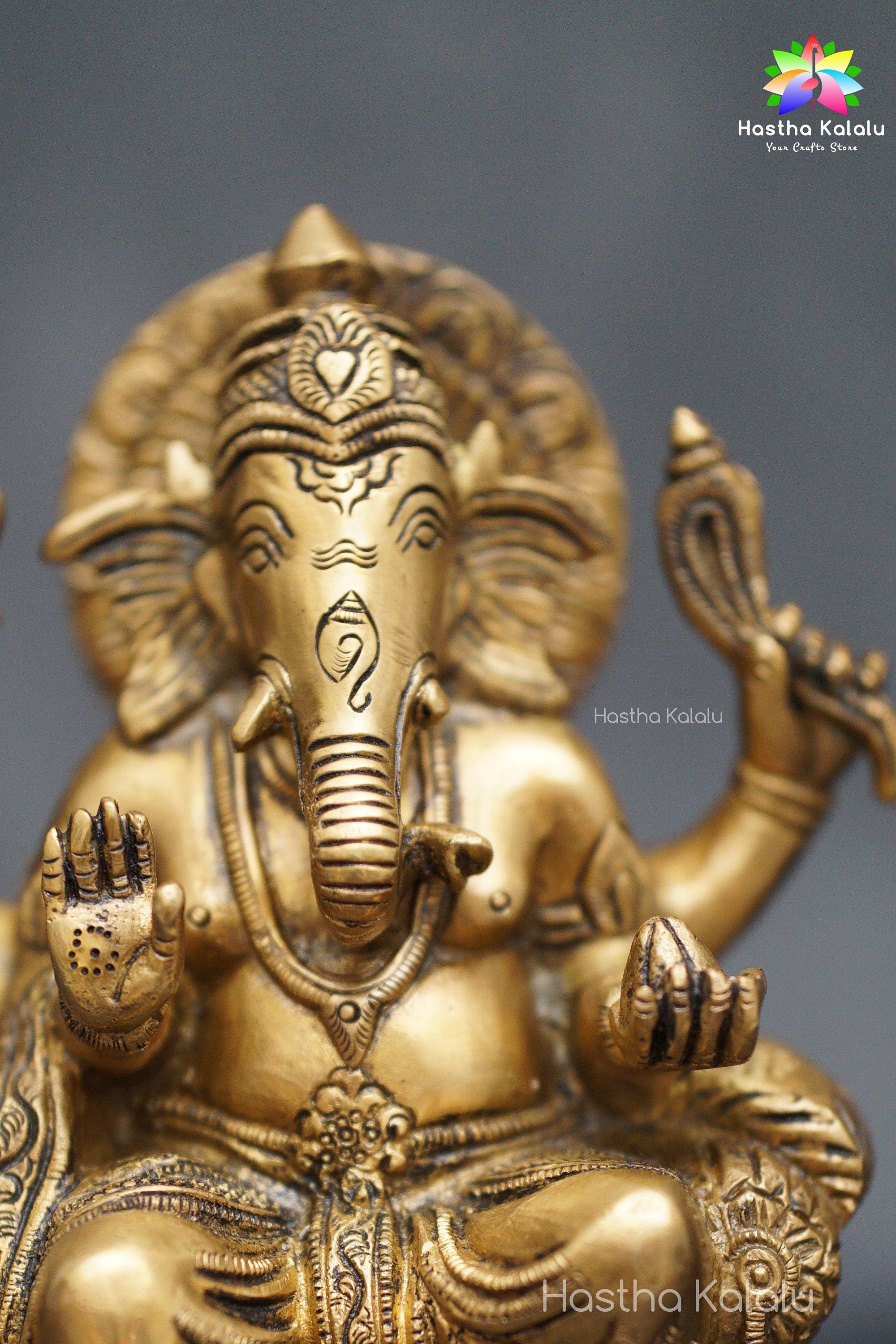 Brass made Stitting Ganesha Figurine